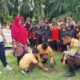 Polisi Dumai Edukasi Anak SD Tentang Lingkungan Sambil Tanam Pohon, Inovasi Peduli Generasi Muda!